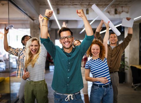 happy employees cheering